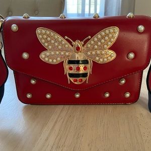 Queen bee crossbody purse with chain and strap